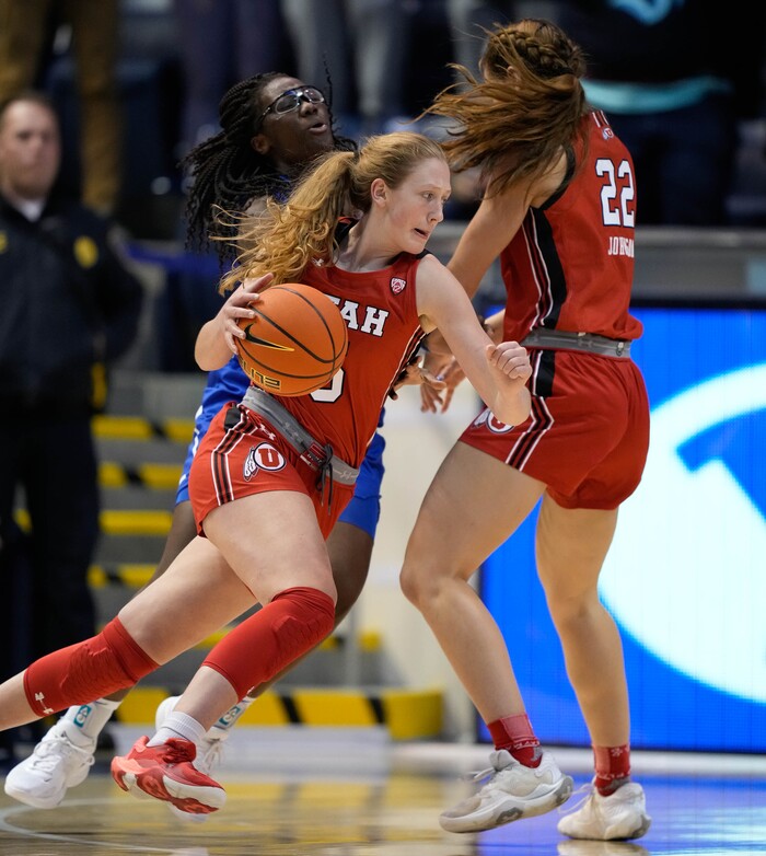 (Francisco Kjolseth | The Salt Lake Tribune) Utah Utes guard Gianna Kneepkens (5) moves the ball in basketball action between the Utah Utes and the Brigham Young Cougars, at the Marriott Center in Provo, on Saturday, Dec. 10, 2022.