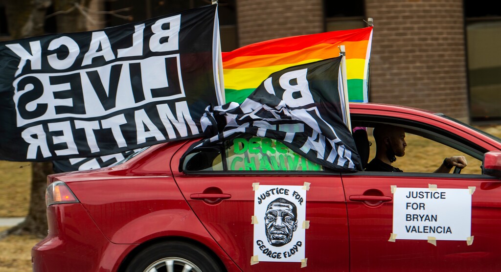 (Rick Egan | The Salt Lake Tribune) Demonstrators honk their horns as they drive in downtown Salt Lake City, during a rally for justice for George Floyd, in solidarity with Minneapolis, as Derek Chauvin's trial starts on Monday, the rally was sponsored by Utah Against Police Brutality, on Saturday, March 6, 2021.