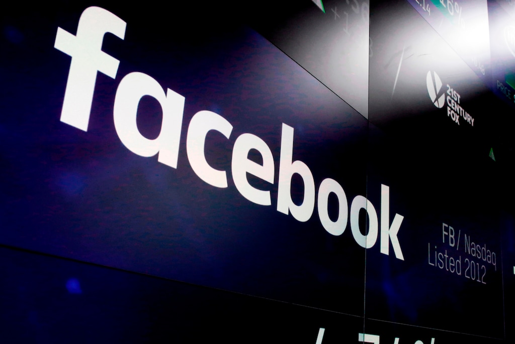 (AP Photo/Richard Drew, File) In this March 29, 2018, file photo, the Facebook logo appears on screens at the Nasdaq MarketSite in New York's Times Square.