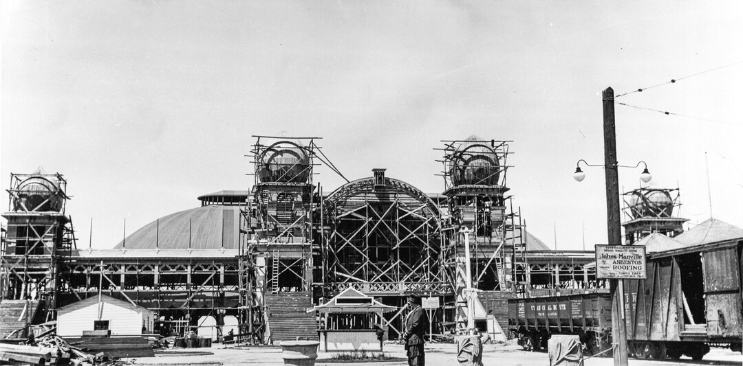 (Utah State Historical Society) Photograph of the second Saltair pavilion under construction in 1925-1926. The sign on the right in the photograph highlights that Saltair II would be built with asbestos shingles, an aid to fire proofing. 