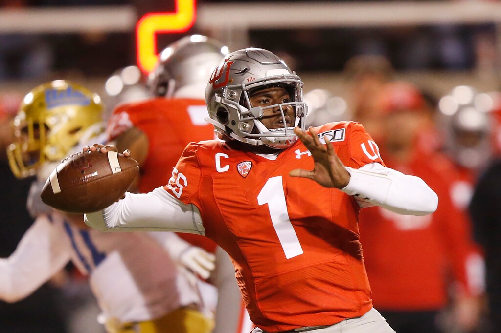 Utah quarterback Tyler Huntley (1) passes the ball against UCLA in the first half during an NCAA college football game Saturday, Nov. 16, 2019, in Salt Lake City. (AP Photo/Rick Bowmer)