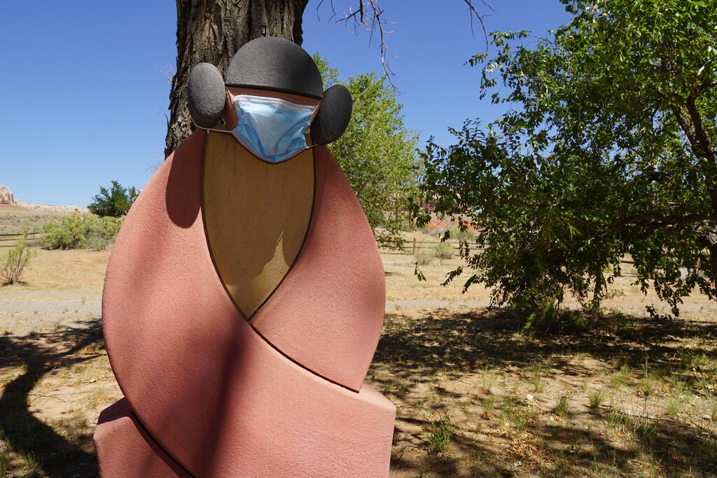 (Zak Podmore | The Salt Lake Tribune) Statue in Bluff Town Park outfitted with a mask after the town council voted to become the third Utah municipality to require masks in indoor public settings on Tuesday, Aug. 11, and the first to do so after a rule change by Utah Gov. Gary Herbert on Aug. 6.