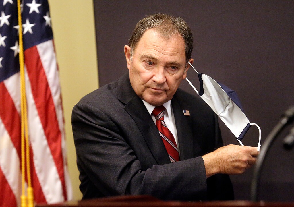 (Kristin Murphy | Deseret News, pool) Gov. Gary Herbert takes off his mask before speaking during a COVID-19 briefing at the Capitol in Salt Lake City on Thursday, July 16, 2020.