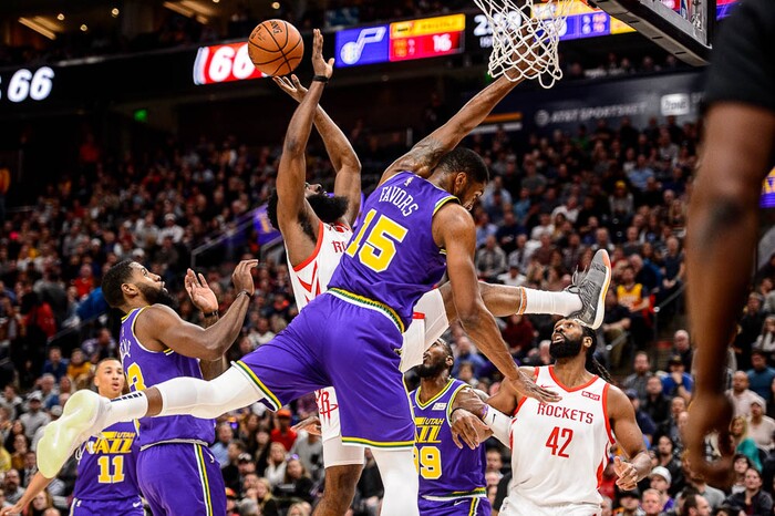 (Trent Nelson | The Salt Lake Tribune)  
Houston Rockets guard James Harden (13) collides with Utah Jazz forward Derrick Favors (15). The Utah Jazz host the Houston Rockets, NBA basketball in Salt Lake City on Thursday Dec. 6, 2018.