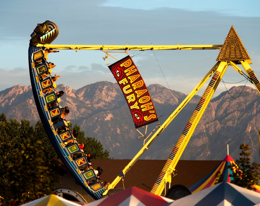 (Rick Egan  |  The Salt Lake Tribune)   The ride Pharaoh's Fury thrills the crowd at the Utah State Fair, on a busy Monday,  Sept. 10, 2018.