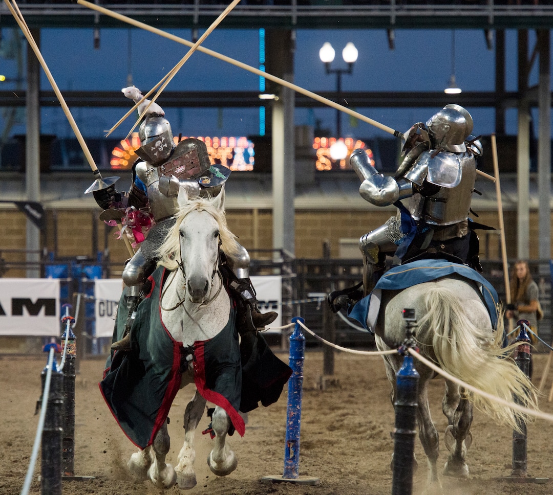 (Rick Egan  |  The Salt Lake Tribune)      Eddie the "Hit Man” Rigney knocks Brian Stephenson off of his horse, in the Knights of Mayhem jousting competition, at the Utah State Fair, Thursday, Sept. 6, 2018.