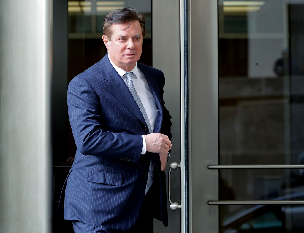 FILE - In this Feb. 14, 2018 file photo, Paul Manafort, President Donald Trump's former campaign chairman, leaves the federal courthouse in Washington. Manafort says in a statement that a Guardian report saying he met with Assange at the Ecuadorian embassy is "totally false and deliberately libelous." Manafort says that he has never been contacted by "anyone connected to WikiLeaks, either directly or indirectly." (AP Photo/Pablo Martinez Monsivais, File)