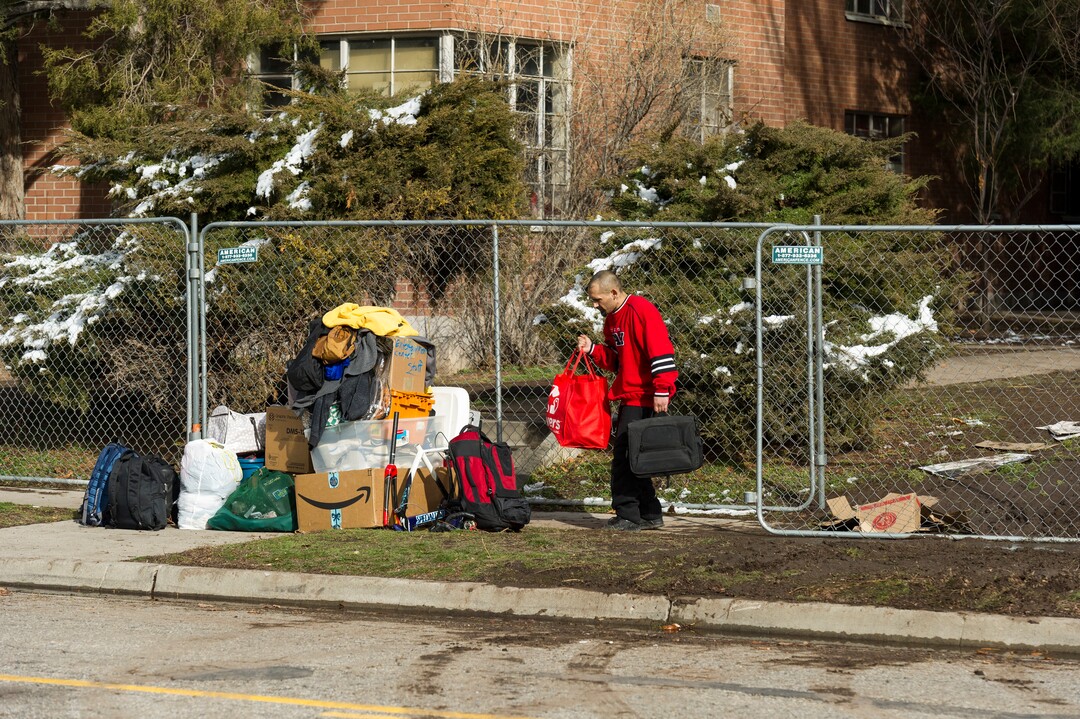 Alex Gallivan  |  Special to the Tribune 

Various agencies from Salt Lake City perform an evacuation of remaining tenants at The Georgia Apartments, Saturday February, 2019