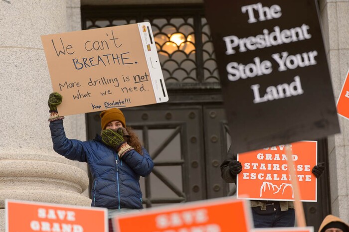 (Trent Nelson | The Salt Lake Tribune) Citizens with signs at a rally on the steps of the State Capitol Building in Salt Lake City against Rep. Chris Stewart's Grand Staircase bill that would create an Escalante National Park. Tuesday December 12, 2017.