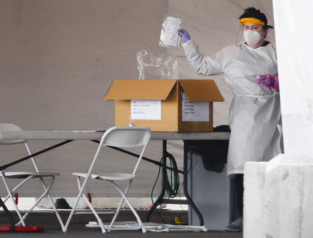 (Francisco Kjolseth | The Salt Lake Tribune) Testing for COVID-19 is performed at the Wasatch County Event Center in Heber City on Wednesday, April 22, 2020, under one of the TestUtah.com contracts the state has with Nomi Health.