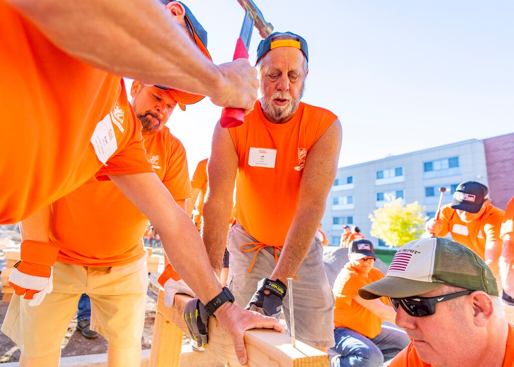 (Rick Egan | The Salt Lake Tribune) More than 600 volunteers, led by Home Depot employees, help spruce up the Sunrise Metro and Freedom Landing apartments in Salt Lake City on Wednesday, Sept. 21, 2022.