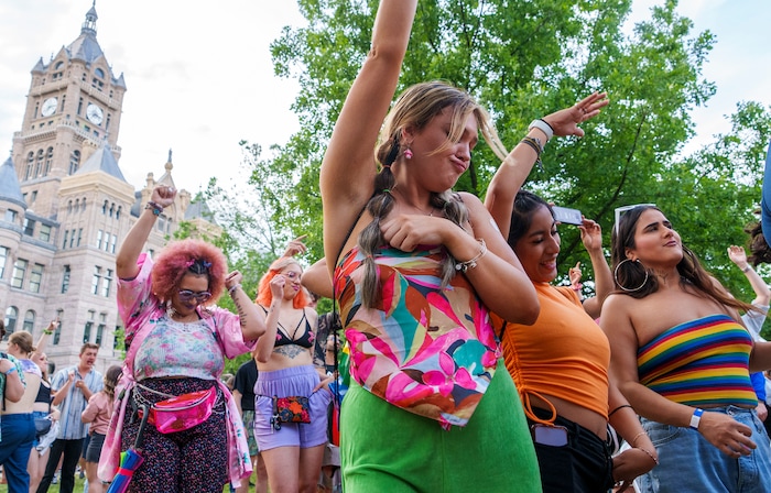 (Leah Hogsten | The Salt Lake Tribune)  Pride festival revelers dance to the music of OneUpDuo at the Utah Pride Festival at Washington Square, Saturday, June 4, 2022. 