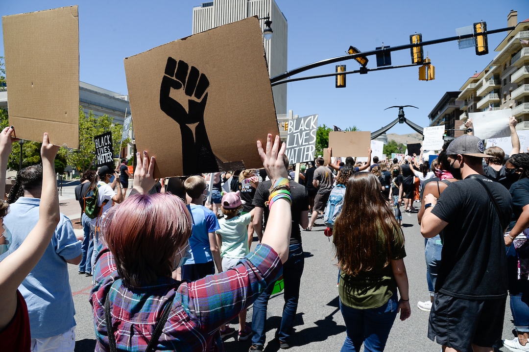 (Francisco Kjolseth  |  The Salt Lake Tribune) Demonstrators march the streets of downtown Salt Lake City for a protest as part of a series of Juneteenth celebrations on Friday, June 19, 2020.