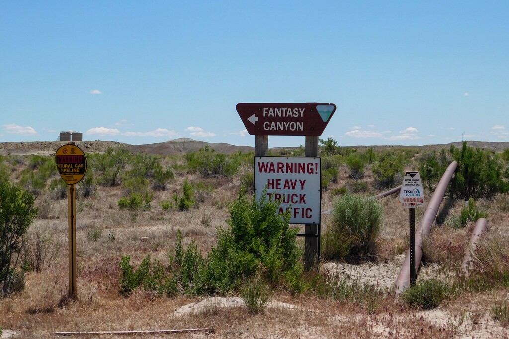 (Erin Alberty  | Tribune file photo) A child was killed and a woman wounded in a shooting at Fantasy Canyon in Uintah County on Monday.


Warnings of drilling activity surround the sign to Fantasy Canyon south of Vernal. Photo taken May 28, 2017.