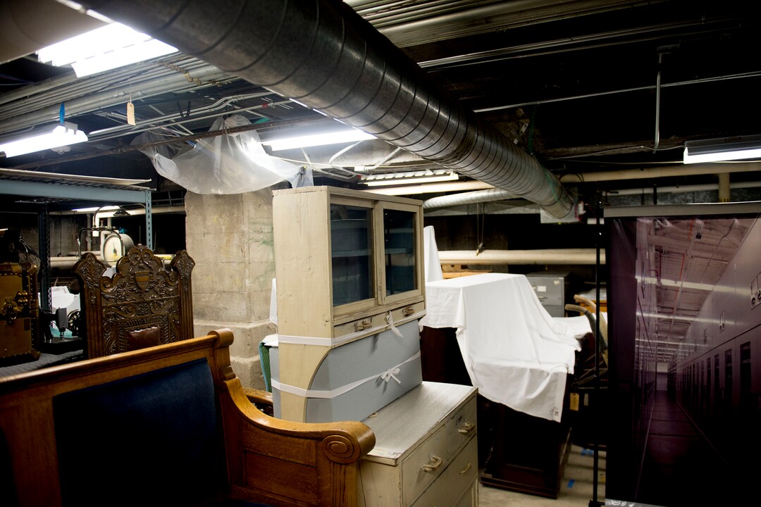 (Jeremy Harmon  |  The Salt Lake Tribune) This white cupboard was built from scraps of wood by a person while they were held at the Topaz Japanese internment camp during WWII. It is one of many artifacts housed in less-than-ideal conditions in the basement of the Rio Grande Depot, home of the Utah state historical offices, on Feb. 15, 2018.