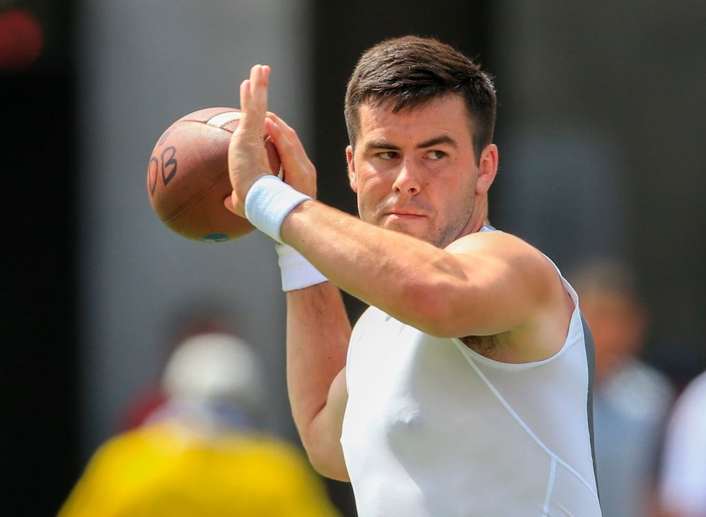 In this Sept. 5, 2015 photo, BYU quarterback Tanner Mangum (12) warms up before an NCAA college football game against Nebraska in Lincoln, Neb., Taysom Hill's third season-ending injury in four years leaves freshman Tanner Mangum to lead BYU through an ambitious schedule that won't ease up any time soon. (AP Photo/Nati Harnik)