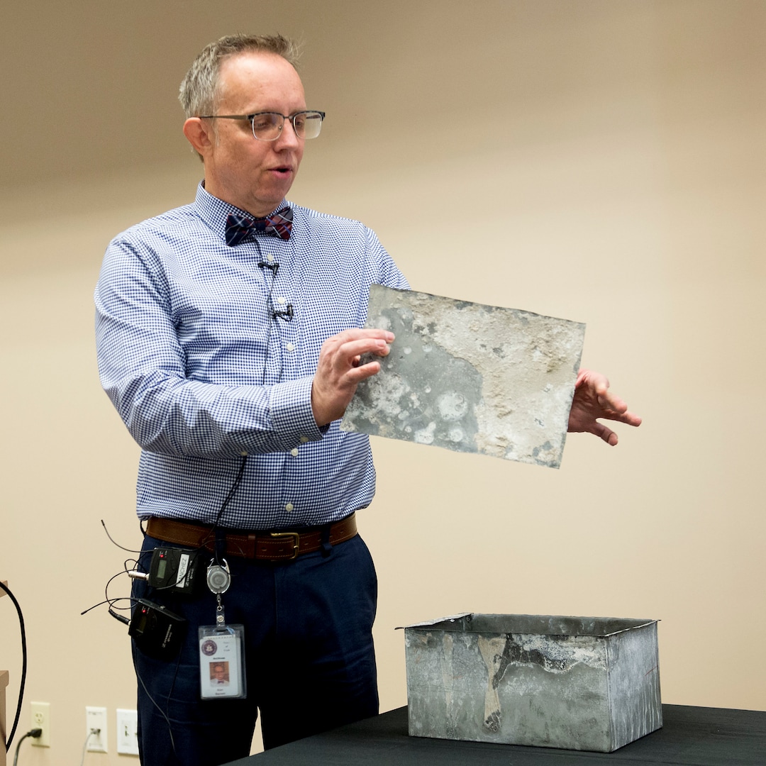 (Jeremy Harmon  |  The Salt Lake Tribune) Archivist Alan Barnett opens a time capsule that was buried in the corner stone of Ogden Academy on September 27, 1887. Items from the time capsule were displayed at the Utah State Archives on Wednesday, Oct. 16, 2019.