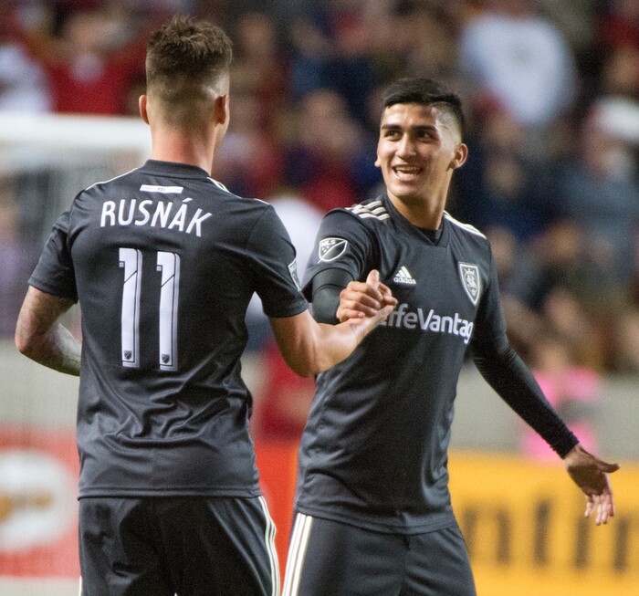 (Rick Egan  |  The Salt Lake Tribune)   Real Salt Lake midfielder Pablo Ruiz (31) congratulates midfielder Albert Rusnak (11) after he scored a goal, in MLS soccer action, between Real Salt Lake and Colorado Rapids,  at Rio Tinto Stadium, Saturday, April 21, 2018.


