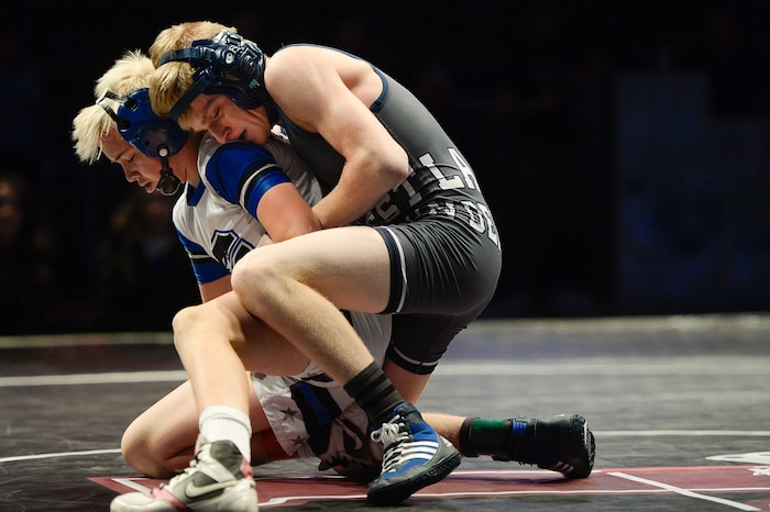 (Francisco Kjolseth  |  The Salt Lake Tribune)  Jacob Finlinson of Westlake battles Zeke Kelley of Pleasant Grove in class 6A 113 weight class during the state wrestling championship match at the Utah Valley University UCCU Center on Thursday, Feb. 8, 2018.