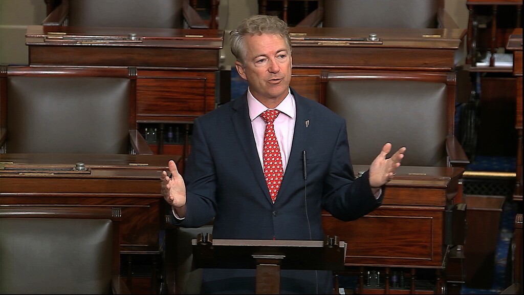 (Senate Television via AP) In this image from video, Sen. Rand Paul, R-Ky., speaks on the Senate floor at the U.S. Capitol in Washington, Wednesday, March 18, 2020. The senator announced Sunday that he has tested positive for the coronavirus.