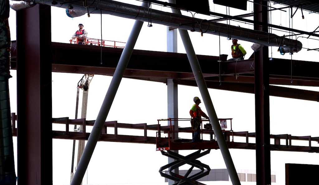 Leah Hogsten | The Salt Lake Tribune Salt Lake City International Airport's first phase construction of the $3.6 billion project is hitting the halfway mark — and large new buildings and elevated roadways are more easily seen. Nearing completion is the new concourse for aircraft gates, an enclosed new terminal, the steel skeleton of a new “gateway” building, a new five-story parking garage and elevated roadways.