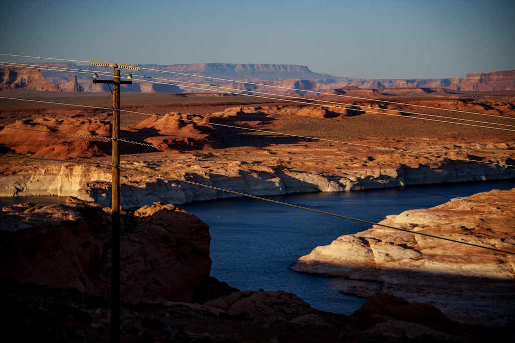 (Trent Nelson  |  The Salt Lake Tribune) Power lines near Lake Powell and Glen Canyon Dam in Page, Ariz., on Monday, May 19, 2025.