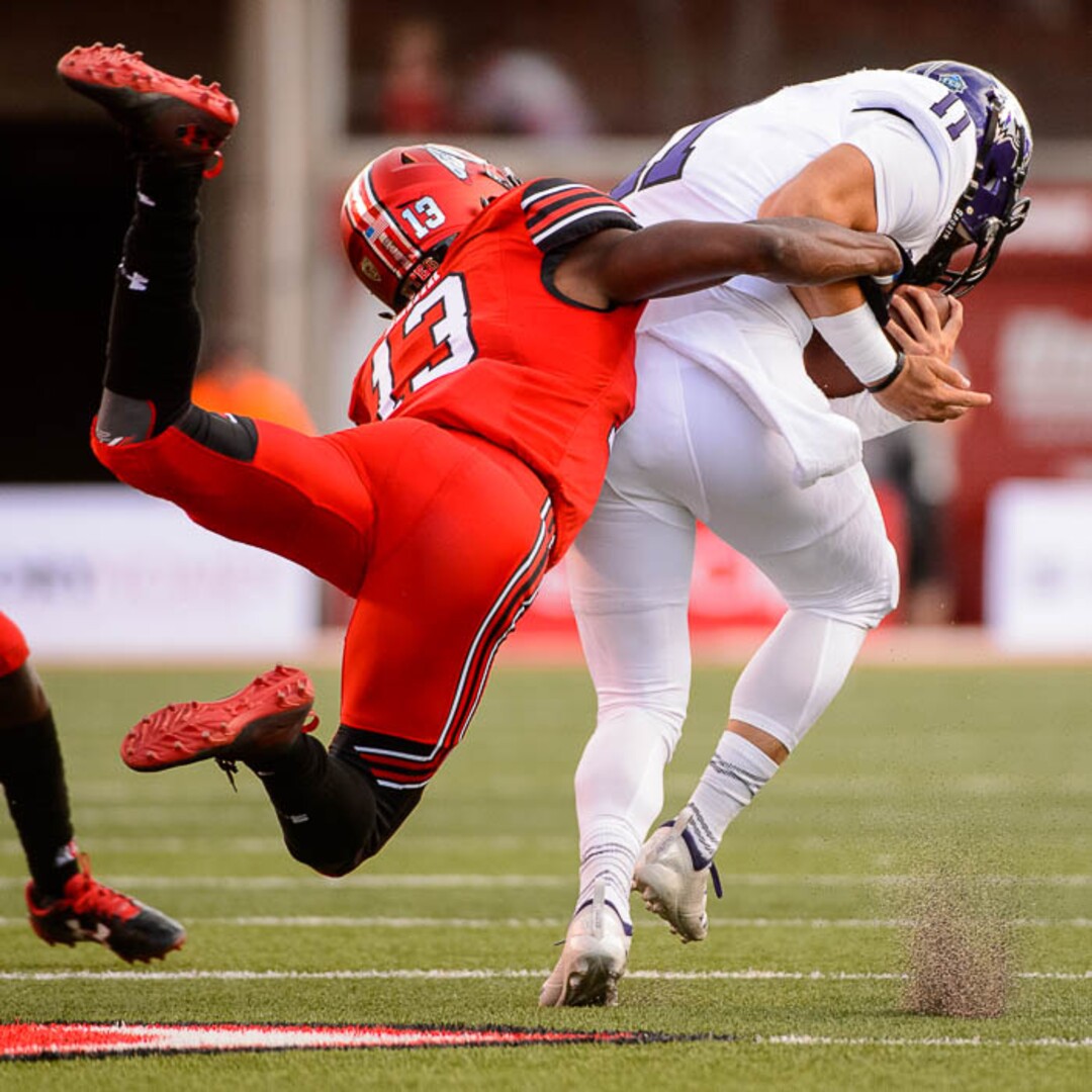 (Trent Nelson | The Salt Lake Tribune)  Utah Utes defensive back Marquise Blair (13) brings down Weber State Wildcats quarterback Kaden Jenks (11) as the University of Utah Utes host the Weber State Wildcats, Thursday Aug. 30, 2018 at Rice-Eccles Stadium in Salt Lake City.