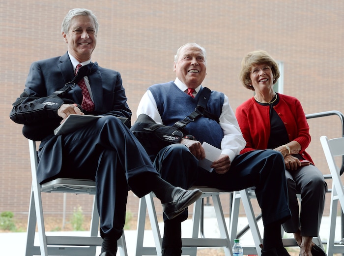 (Steve Griffin  |  Tribune File Photo)  Utah athletic director Chris Hill and Jon and Karen Huntsman laugh as University of Utah head men's basketball coach Larry Krystkowiak talks during grand opening ceremony of the Jon M. and Karen Huntsman Basketball Center  on the University of Utah campus in Salt Lake City, Thursday, October 1, 2015.