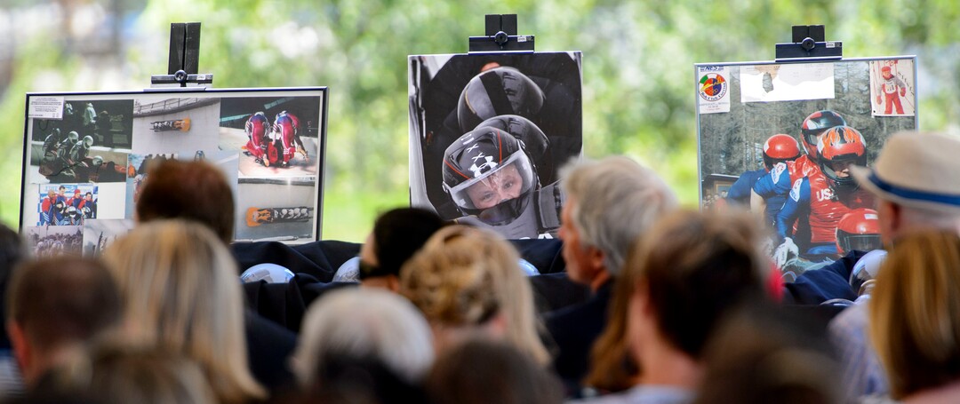 Steve Griffin  |  The Salt Lake TribunePhotographs of Steve Holcomb surround  the audience as Park City and the Holcomb family and friends hold a memorial to honor the late 37-year-old Park City gold medalist bobsledder who passed away suddenly in Lake Placid last month. The remembrance was held in the summer pavilion at Utah Olympic Park Park City Saturday June 10, 2017.