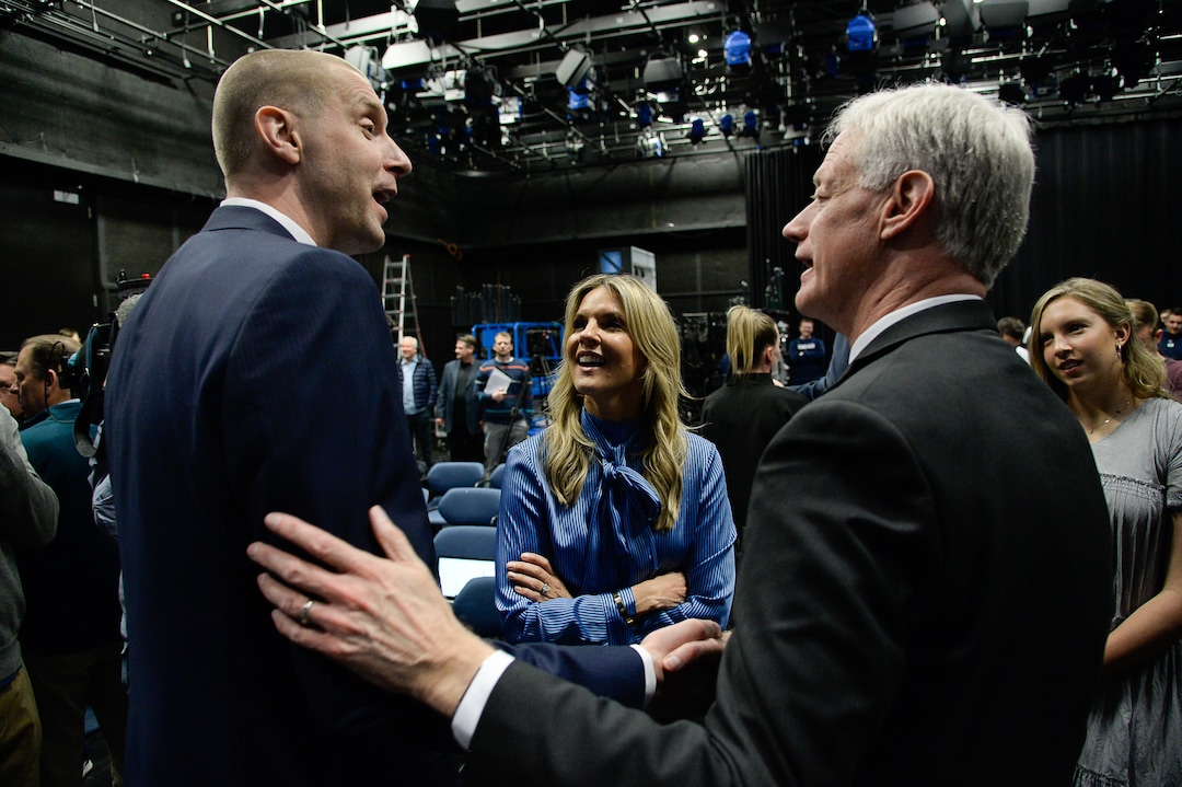 (Francisco Kjolseth  |  The Salt Lake Tribune)  Mark Pope, alongside his wife Lee Anne speaks with BYU president Kevin Worthen after being introduced as its new head basketball coach during a press event at the BYU broadcasting building on Wed. April 10, 2019.