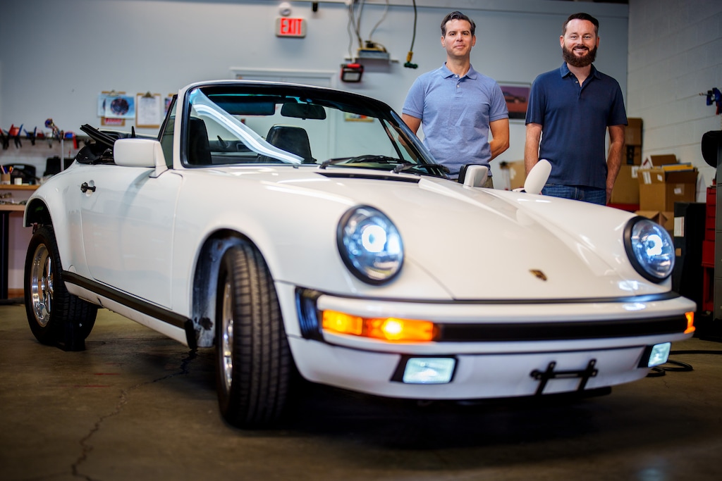 (Trent Nelson  |  The Salt Lake Tribune) Martine Prouty and Kyle Palmer, with their company, The Current Exchange, are electrifying a 1989 Porsche 911 Cabriolet. They were photographed in Salt Lake City on Wednesday, April 13, 2022.