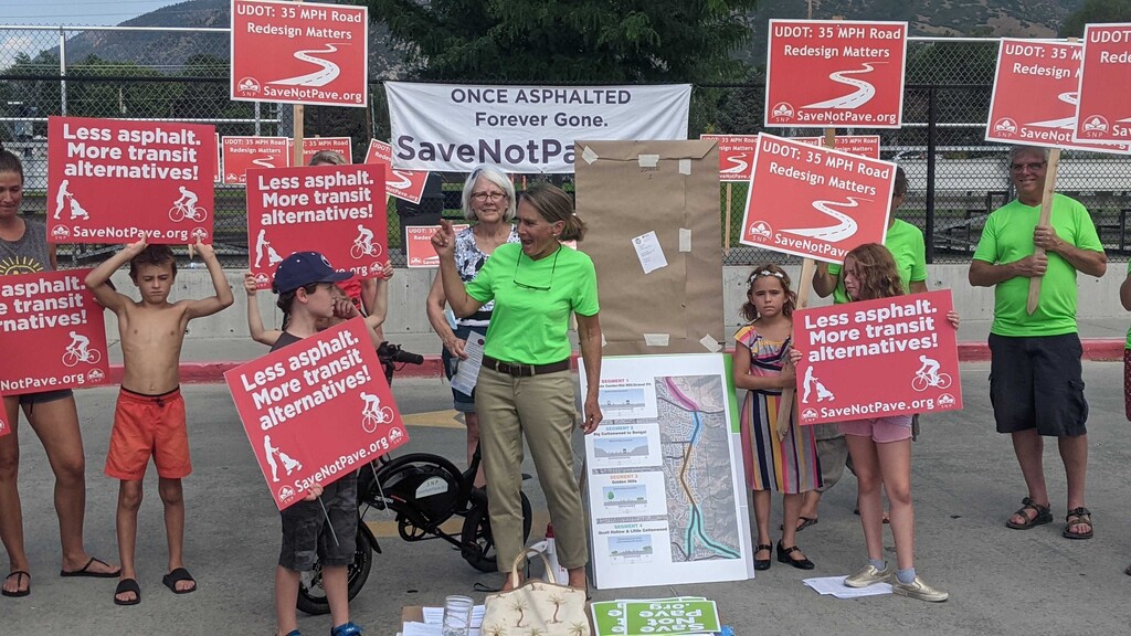 (Connor Sanders | The Salt Lake Tribune) Ellen Birrell, co-founder of Save Not Pave, outlines her concerns with UDOT's proposed expansion to Wasatch Boulevard in the parking lot of Butler Middle School on Tuesday. Save Not Pave recommended a new transit hub be built on 9400 South and Highland Drive instead of the gondola and enhanced bus usage proposals preferred by UDOT.