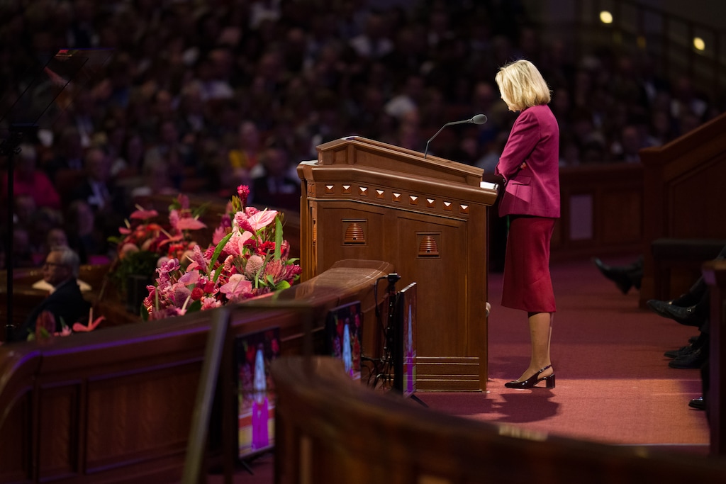 (Trent Nelson  |  The Salt Lake Tribune) President Camille Johnson prays at a session of General Conference. Columnist Gordon Monson says believers should keep their prayers "real."