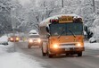 (Al Hartmann  |  The Salt Lake Tribune) School bus in Sugarhouse runs on time Tuesday morning Dec. 15 as the city digs out from yesterday's record breaking snowfall.