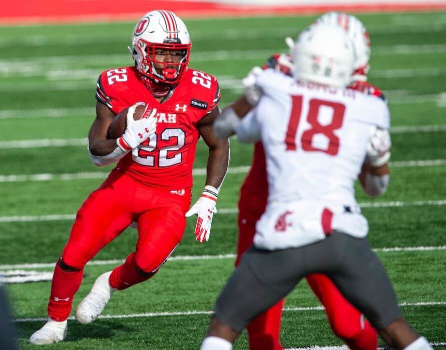 (Rick Egan | The Salt Lake Tribune) Utah  running back Ty Jordan (22) runs the ball for the Utes, in PAC-12 football acton between Utah Utes and Washington State Cougars at Rice-Eccles Stadium on Saturday, Dec. 19, 2020.