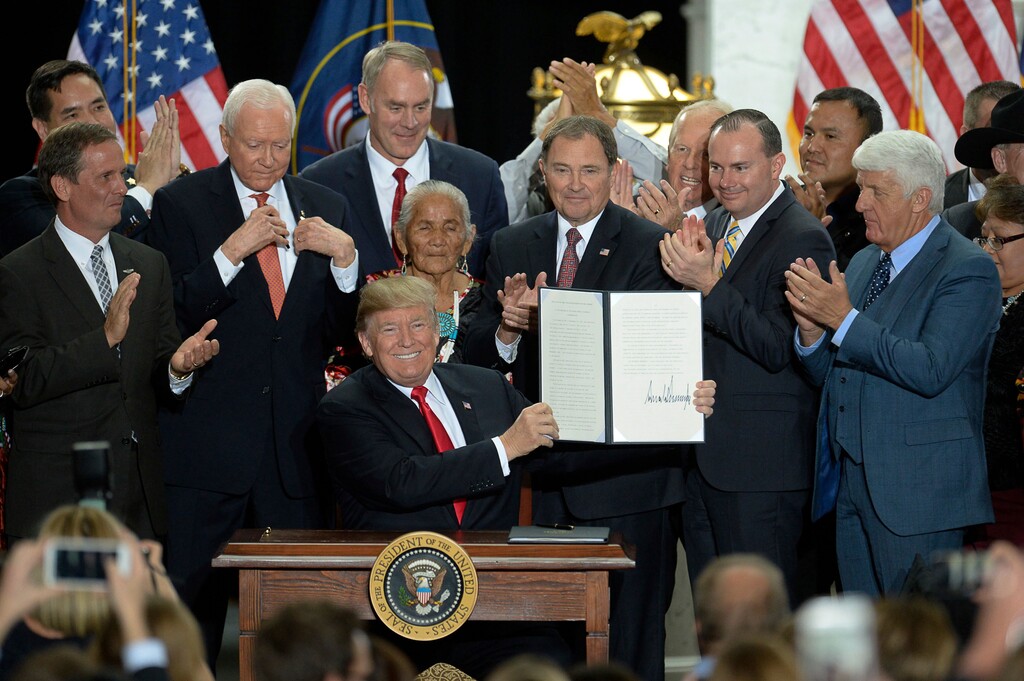 (Francisco Kjolseth | Tribune file photo) President Donald Trump is surrounded by Utah representatives at the Utah Capitol on Monday, Dec. 4, 2017, after signing two presidential proclamations to shrink Bears Ears and Grand Staircase-Escalante national monuments.