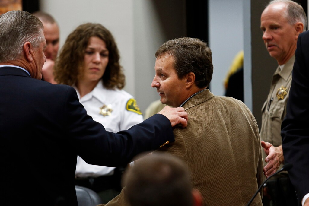 Donald Bills speaks with his defense attorney before leaving the court room on Thursday, July 2, 2015 at the Fourth District Court in Provo. Bills entered guilty pleas on all counts stemming from a sexual relationship he had with a student during his time working as a teacher at Provo High School. SPENSER HEAPS, Daily Herald