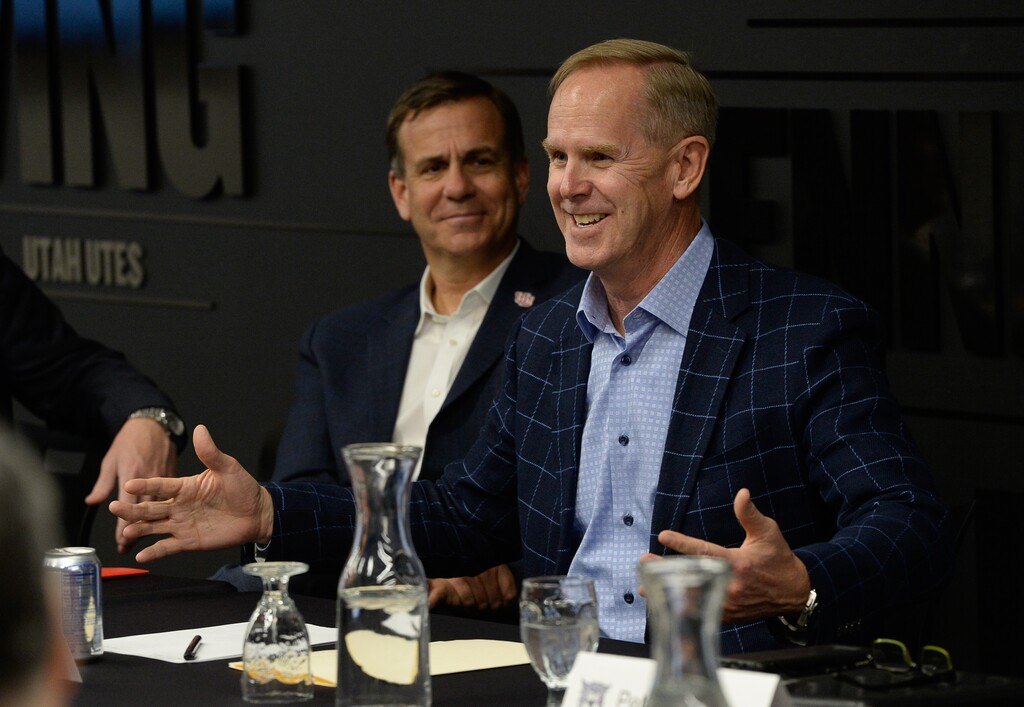 (Francisco Kjolseth | The Salt Lake Tribune) Athletic directors Mark Harlan, left, from the University of Utah and Tom Holmoe from BYU join other athletic directors from from around the state at the U. of U. as Senator Mitt Romney talks about ways to increase the compensation to student athletes on Friday, Nov. 15, 2019. Romney has been putting pressure on the NCAA to allow athletes to make money off of their likeness or for appearances.