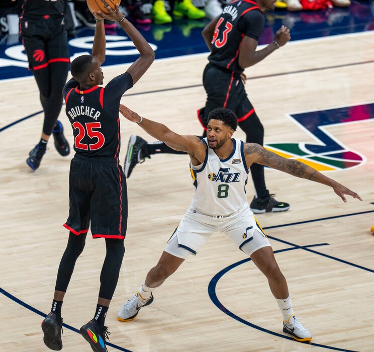 (Rick Egan | The Salt Lake Tribune) Toronto Raptors forward Chris Boucher (25) shoots as Utah forward Rudy Gay (8) defends, in NBA action between Utah Jazz and Toronto Raptors, at Vivint Arena, in Salt Lake City, on  Thursday, Nov. 18, 2021.