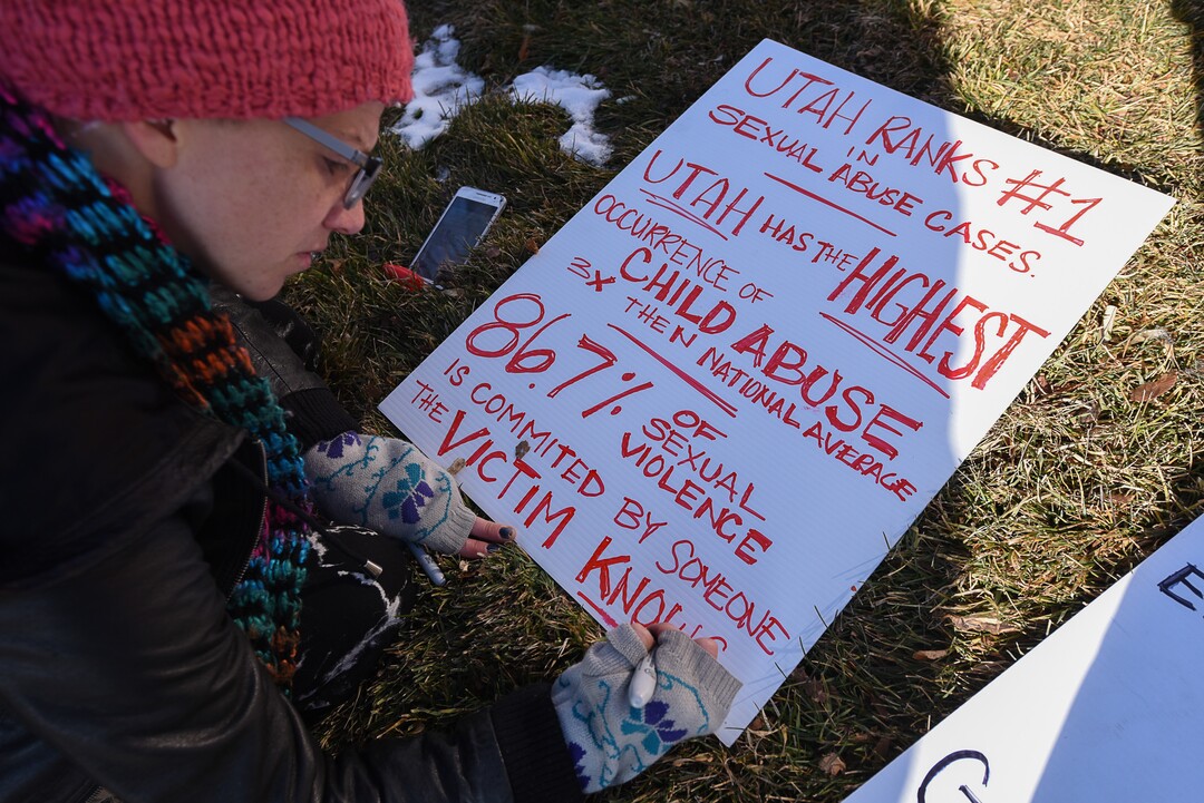 (Francisco Kjolseth  |  The Salt Lake Tribune)  Shell Danis joins other activists in Utah to protest Salt City Tattoo on Friday, Dec. 22, 2017, following an Instagram post made by the shop's official Instagram account. The post in question was of a gift provided during the shop's white elephant exchange, a gift one of the artists at the parlor called a "rape kit," containing leather gloves, black duct tape, a bottle of lubricant, rope, and a knife.