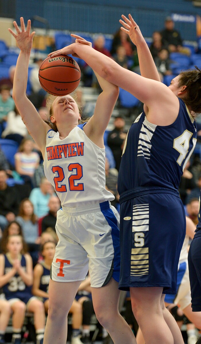 (Leah Hogsten  |  The Salt Lake Tribune) Timpview's Hannah Glazier (22) is stopped by Skyline's Cameron Mooney (40).  Timpview faces Skyline in their semifinal game of the 5A High School Girls' Basketball Tournament at SLCC in Taylorsville, Friday, Feb. 23, 2018. 