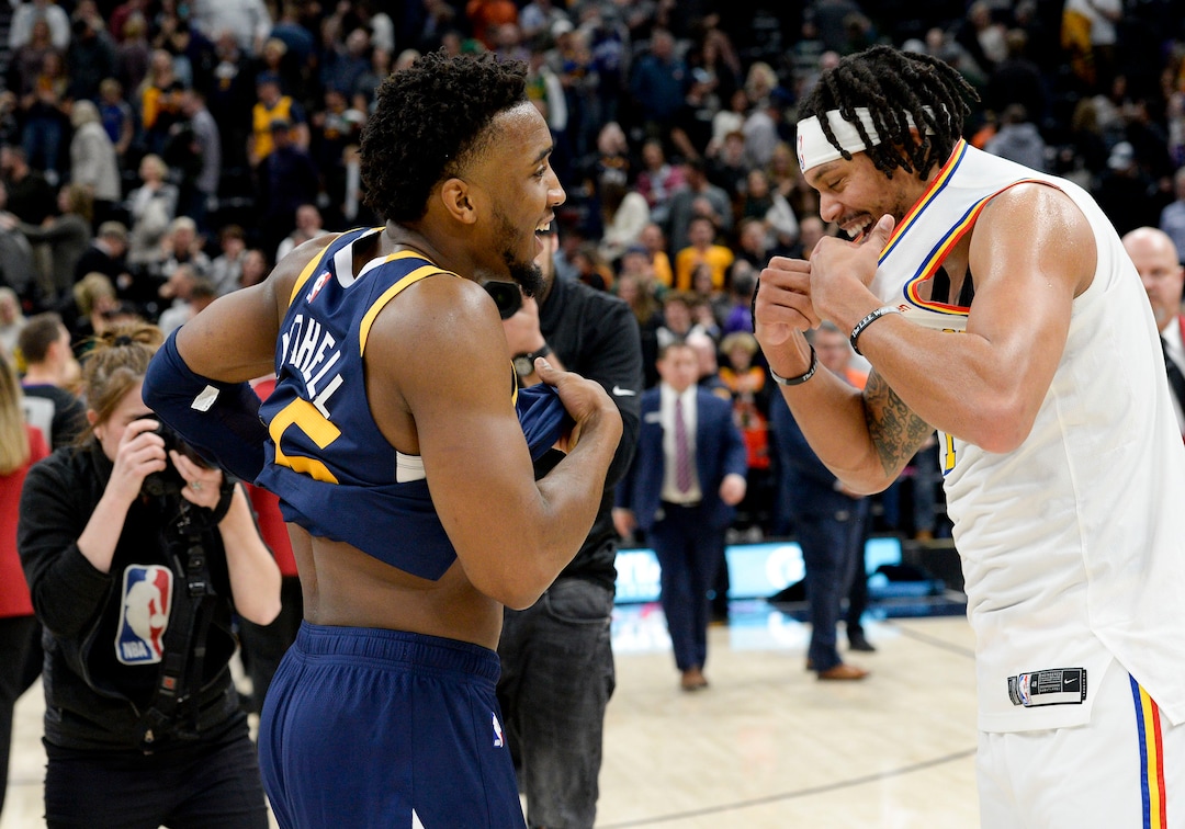 (Leah Hogsten  |  The Salt Lake Tribune) Golden State Warriors guard Damion Lee (1) and Utah Jazz guard Donovan Mitchell (45) trade shirts after the game. The Utah Jazz defeated the Golden State Warriors, 114-106, Dec. 13, 2019 at Vivint Arena.