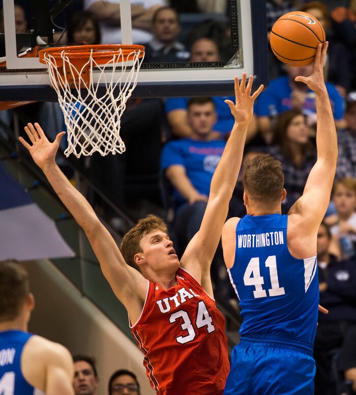 (Rick Egan  |  The Salt Lake Tribune)  Brigham Young Cougars forward Luke Worthington (41) shoots overUtah Utes forward Jayce Johnson (34), in basketball action Utah Utes vs. Brigham Young Cougars at the Marriott Center in Provo, Saturday, December 15, 2017.


