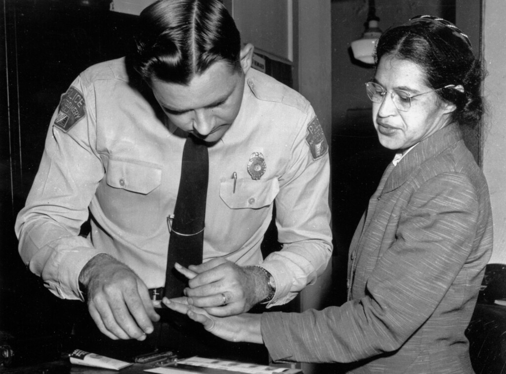 (Gene Herrick | AP photo)

In this Feb. 22, 1956, photo, Rosa Parks is fingerprinted by police Lt. D.H. Lackey in Montgomery, Ala., after refusing to give up her seat on a bus for a white passenger on Dec. 1, 1955.