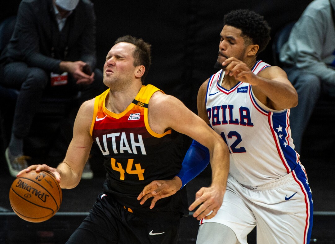 (Rick Egan | The Salt Lake Tribune) Utah Jazz forward Bojan Bogdanovic (44) reacts after being poked the eye, as Philadelphia 76ers forward Tobias Harris (12) defends, in NBA action between the Utah Jazz and the Philadelphia 76ers at Vivint Arena, on Monday, Feb. 15, 2021.