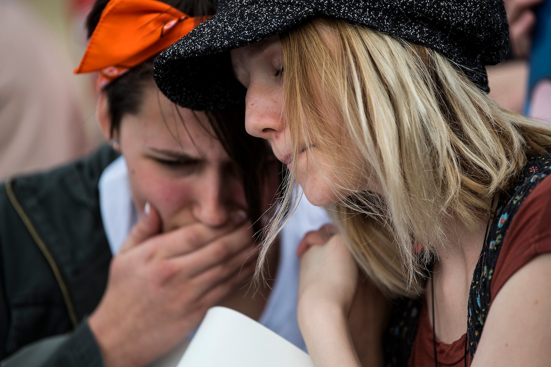 (Chris Detrick  |  The Salt Lake Tribune)  Danielle Creer 14, right, and Grace Meservy, 15, listen during the March for Our Lives SLC rally at the state Capitol Saturday, March 24, 2018. The student-led March for Our Lives SLC got underway about 11:30 a.m. with what police estimated were 8,000 participants walking from Salt Lake City’s West High School to the front steps of the state Capitol.