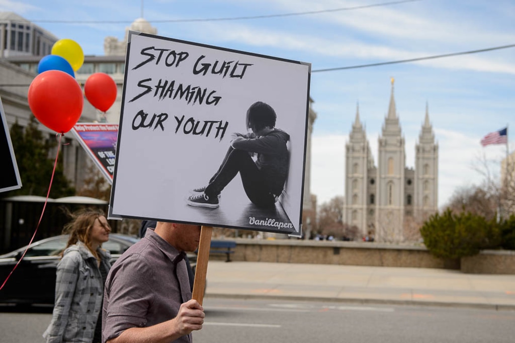 (Trent Nelson | The Salt Lake Tribune)
People, including members of the Mormon Church, held a rally and marched to the LDS Church Office Building in Salt Lake City to request that the faith's leaders put an end to bishops meeting one-on-one with children for interviews. Friday March 30, 2018.