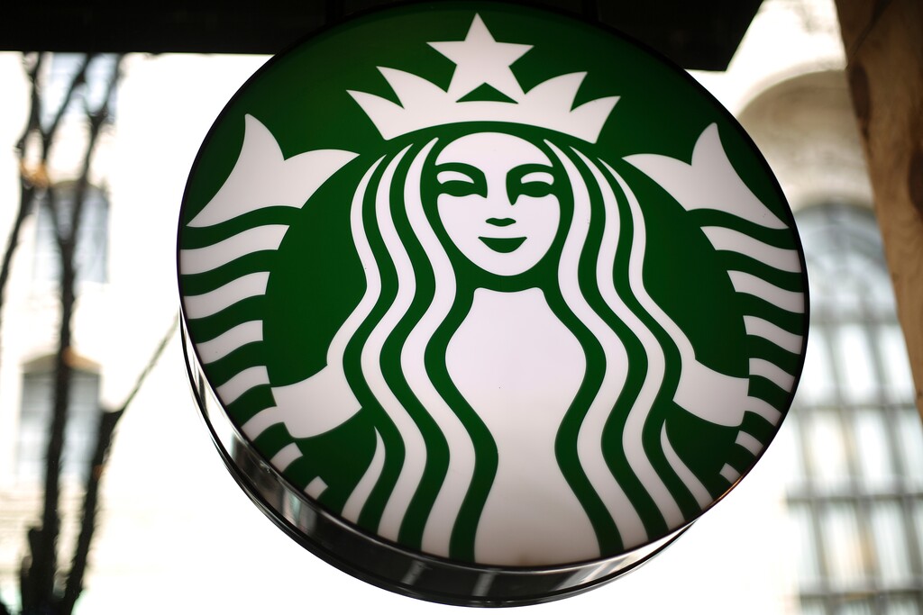 (Gene J. Puskar | The Associated Press) This March 24, 2018, file photo shows a sign in a Starbucks in downtown Pittsburgh. Starbucks is getting rid of plastic straws at its locations around the world. The coffee company said Monday, July 9, 2018, that it’ll offer a strawless lid or straws made of paper or compostable material instead.