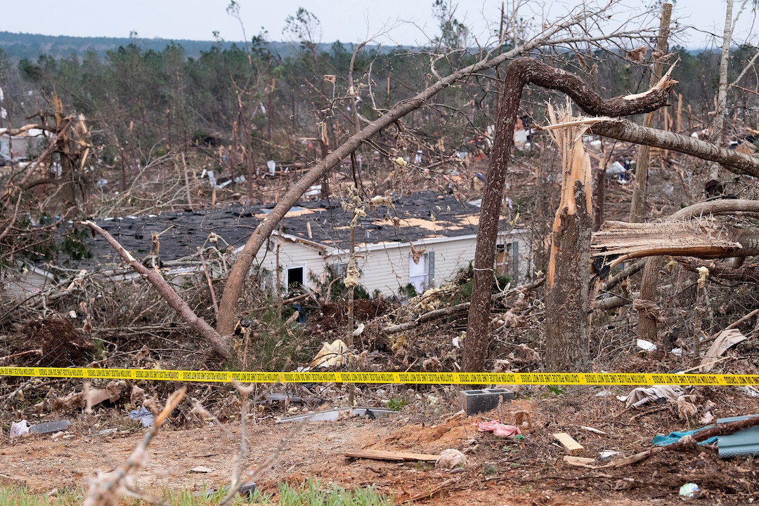 Tornado damage near Beauregard, Ala., on Monday March 4, 2019. Friends in eastern Alabama are helping tornado survivors retrieve the scattered pieces of their lives after devastating winds destroyed their homes and killed at least 23 people. (Mickey Welsh/Montgomery Advertiser via AP)