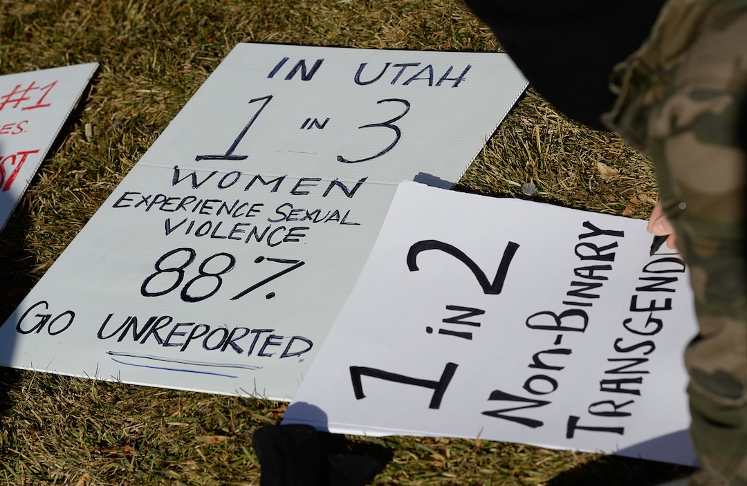 (Francisco Kjolseth  |  The Salt Lake Tribune)  Activists in Utah gather outside of Salt City Tattoo on Friday, Dec. 22, 2017, to protest following an Instagram post made by the shop's official Instagram account. The post in question was of a gift provided during the shop's white elephant exchange, a gift one of the artists at the parlor called a "rape kit," containing leather gloves, black duct tape, a bottle of lubricant, rope, and a knife.